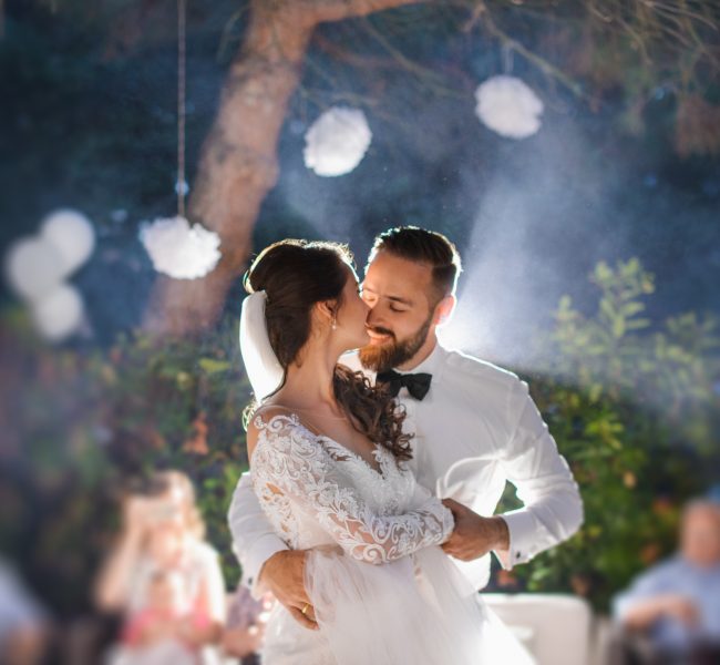 A bridal couple is dancing at the wedding night A bridal couple is dancing at the wedding night